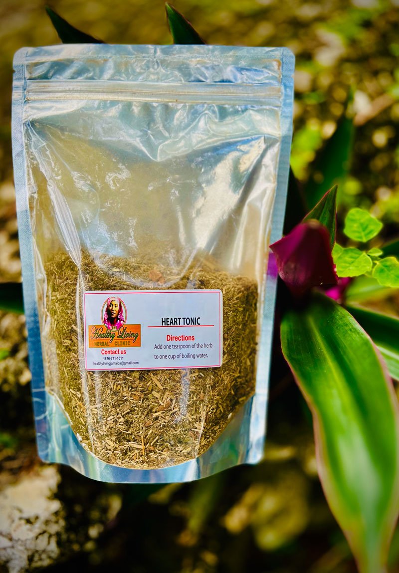 A sealed bag of dried herb labeled 'Holy Basil' outdoors.