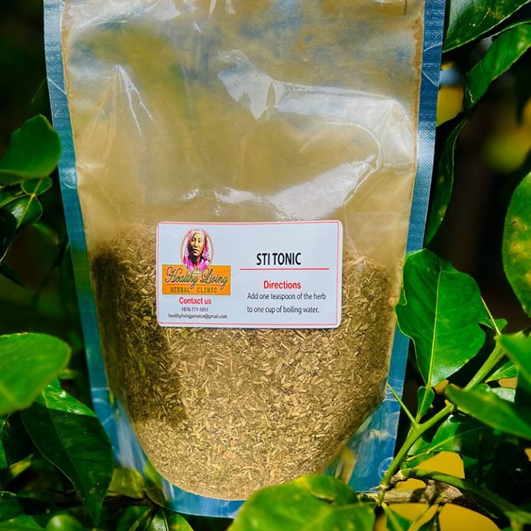 A sealed bag of dried oregano leaves outdoors among green foliage.